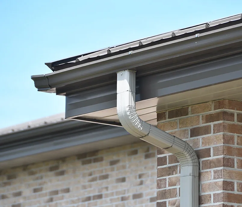 Dedicated Roofing team member working on a rooftop in Calgary.